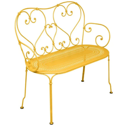 Colorful Fermob 1900 decorative bench with a sleek, modern design, perfect for indoor or outdoor seating.