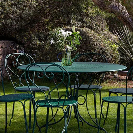 Fermob 1900 outdoor chair with a colorful, slatted design, perfect for patio or garden seating.