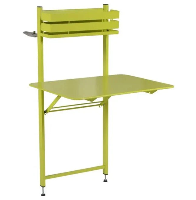 Fermob foldable Bistro Balcony Table outdoors on a rooftop patio, suitable for balconies and outdoor spaces.