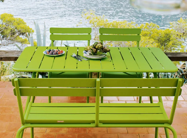 Fermob Luxembourg bar table measuring 143x80 cm in green aluminum, ideal for modern contract or outdoor furniture settings.