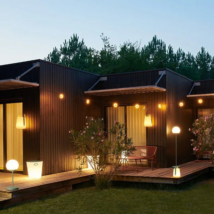 Outdoor Fermob Sixties Sofa with sleek modern design, featuring plush cushions and a sturdy frame for stylish outdoor lounging.