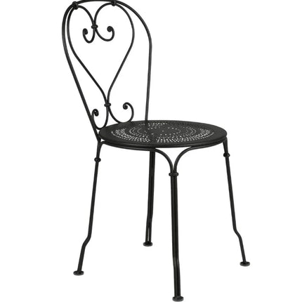 Fermob 1900 outdoor chair with colorful metal slatted design, suitable for garden or patio seating.