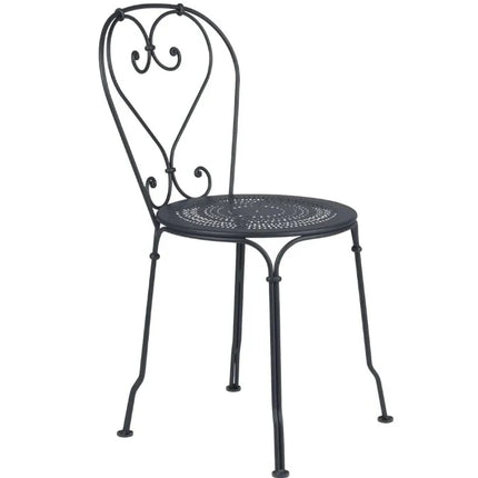 Fermob 1900 outdoor chair with colorful metal design, suitable for hotel, restaurant, or cafe patio seating.