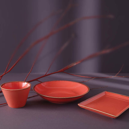 Amber salt shaker by Porland, a stylish glass salt shaker with amber tint, perfect for seasoning at the dining table.